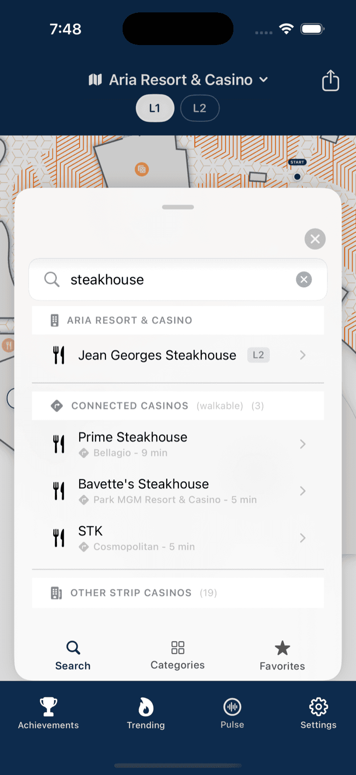 A search for 'steakhouse' returning results grouped by this casino, then connected walkable casinos with walk times, then other Strip casinos